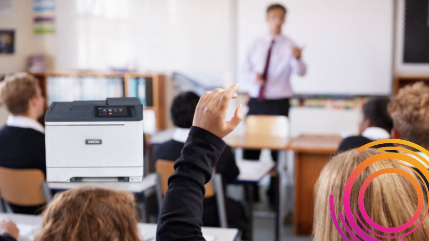Office workers using Xerox AltaLink B8200 multifunction printer in a modern workspace, showcasing managed print services in action.